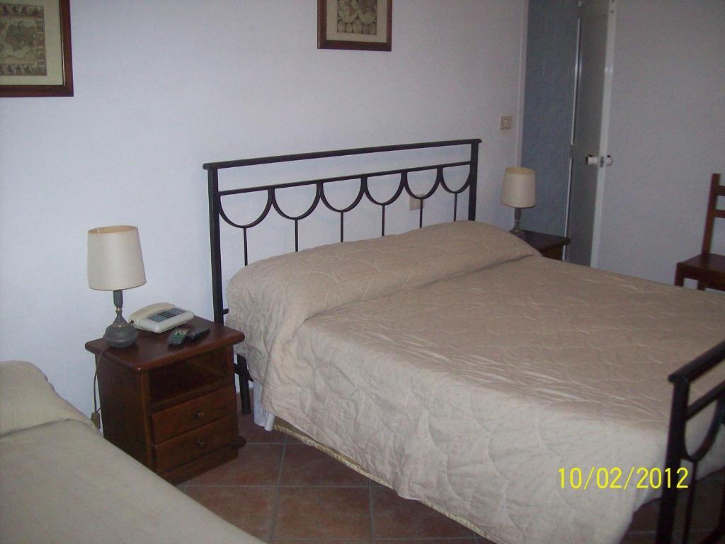 Albergo La Perla Orbetello Rum bild